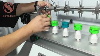 Probador de bisagras de tapa para cosméticos